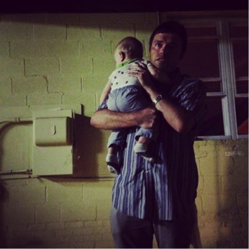 Scott and a frightened baby.